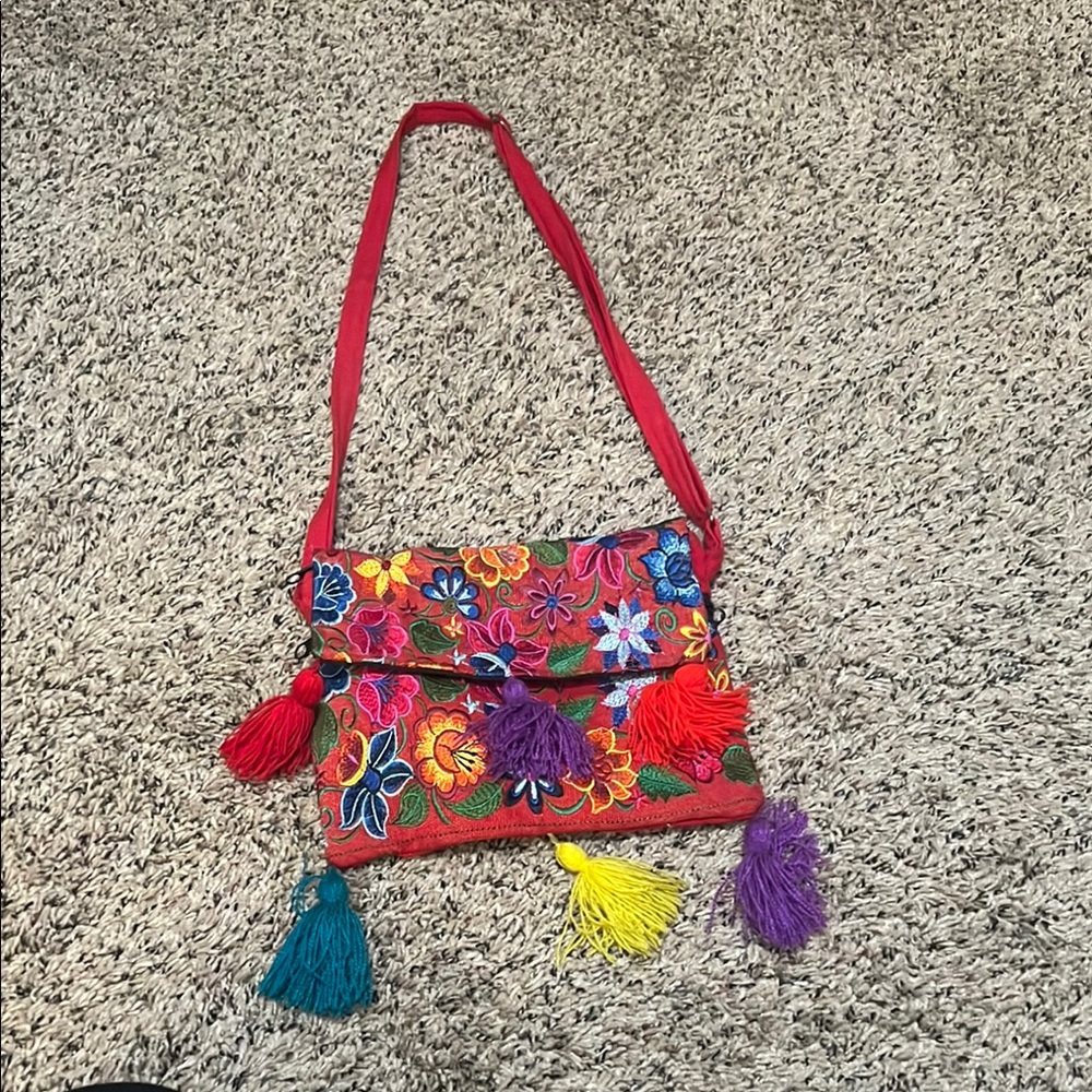 Red and Purple Crossbody Bag with Intricate Patterns